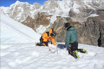 snow sampling at 20,000 feet (Lobuche East) in the Himalaya (Nepal) with a Sherpa field assistant; photo credit: Ang Tendi Sherpa
