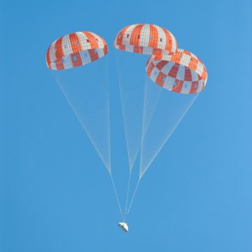 Orion with parachutes open