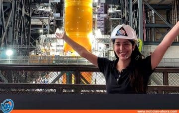 Nathalie Quintero next to the SLS in the VAB